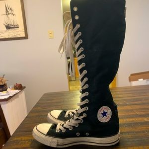 Early 2000s emo knee high converse.